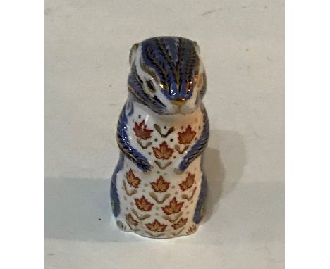 A Royal Crown Derby paper weight modelled as a chipmunk. Red mark, Gold stopper, First Quality. No scratch marks.Condition: I