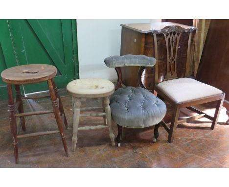 A Victorian carved mahogany dining chair, an upholstered low chair with button detailing and tow pine stools. (4)