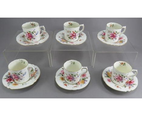A group of Royal Crown Derby coffee cup and saucers. (12)In good condition. 