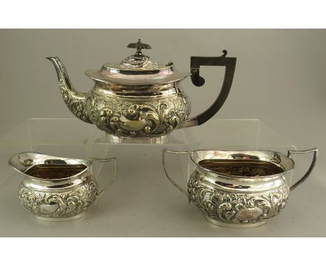 A three-piece EPNS tea service to include a teapot, sugar and creamer.&nbsp; J C &amp; Co., (3)