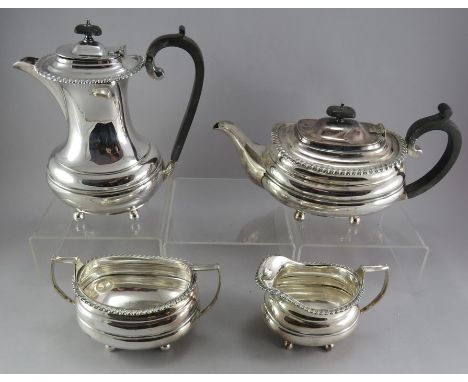 A four-piece plated tea and coffee service with gadrooned edges. Teapot, coffeepot, sugar and creamer. (4)