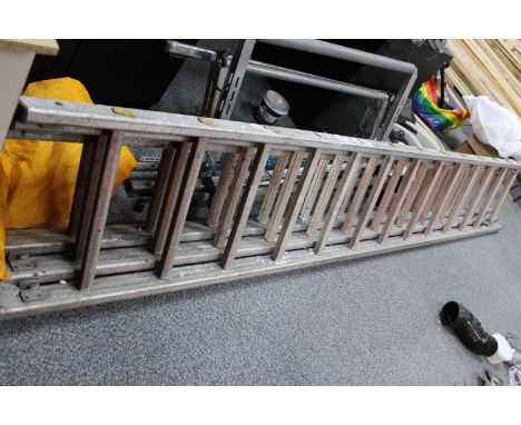 A triple extending ladder (items not on site viewing by appointment, collection only) 