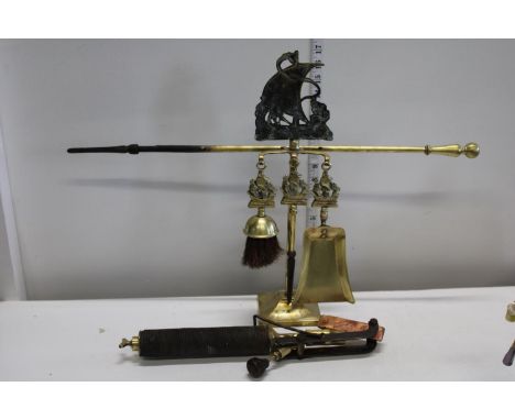 A vintage antique soldering iron and brass fireside compendium set 