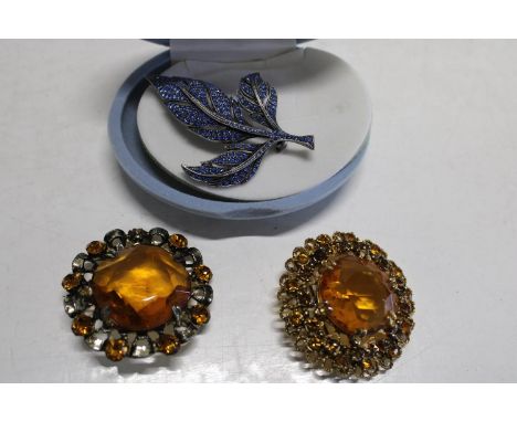 Three large vintage costume brooches 