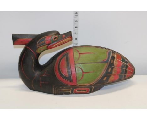 A vintage Native American wooden bird carving (Has had a repair) 