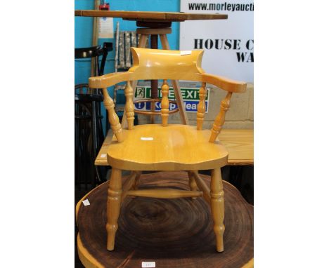 A child's light wood chair 