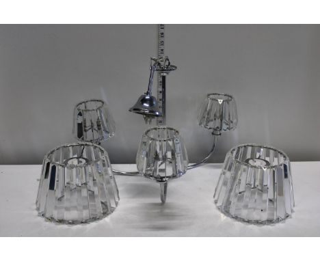 A contemporary ceiling light and shades 