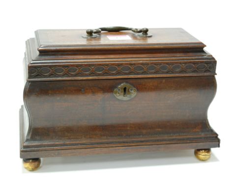 A George III mahogany and inlaid fitted tea caddy, of bombe form with secret side drawer