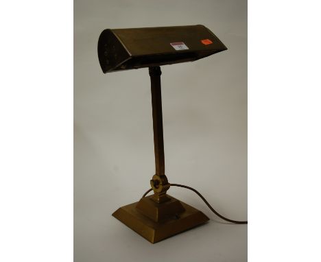 A brass desk lamp