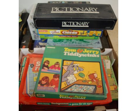 Three boxes of miscellaneous toys and games to include Trivial Pursuit, Pictionary, Backgammon etc