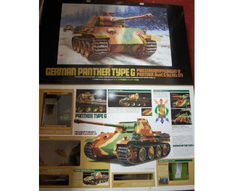 A boxed 1.16 scale radio controlled German Panther tank type G together with one other King Tiger tank (2)