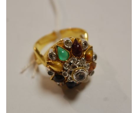 A far eastern gilt metal and semi precious set cluster ring
