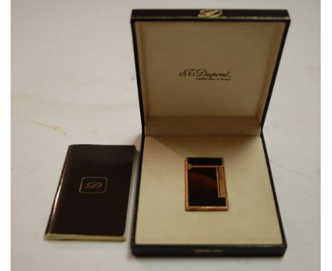 A cased Dupon pocket cigarette lighter, with supporting ephemera 