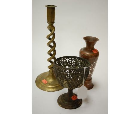 A brass candlestick and two Eastern copper vases (3)