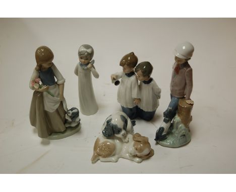 A collection of Nao porcelain figures, and one other (5)