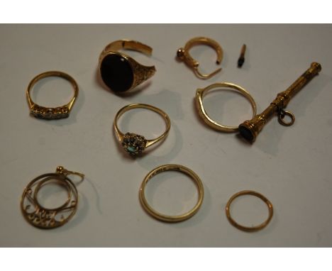 A bag of assorted gold and yellow metal to include hardstone set signet ring, diamond point set dress ring, propelling pencil