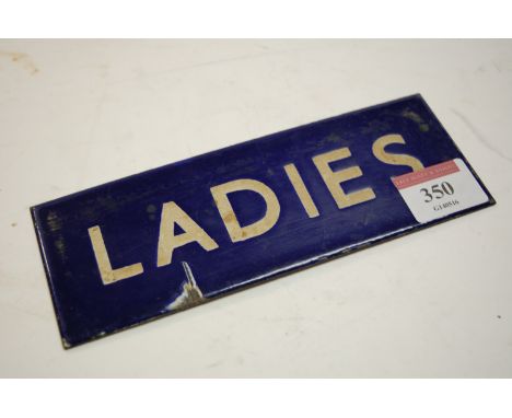 A small early 20th century BR Eastern blue and white ladies enamel door sign