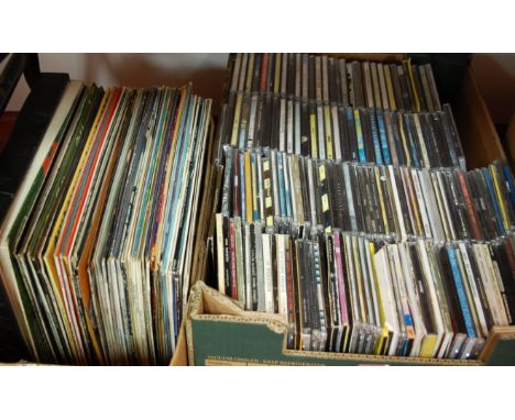 Two boxes of assorted compact discs and long playing records etc