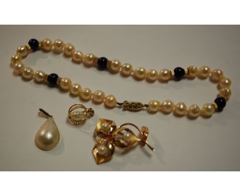 A modern pearl lapiz and gilt metal single string choker, an 18ct gold ruby and pearl set brooch, and two pearl set pendants 