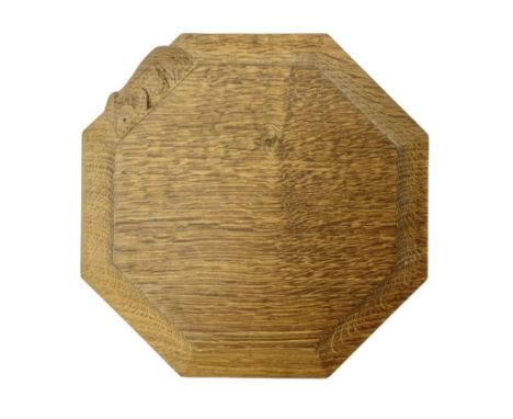 Mouseman - Yorkshire oak small octagonal chopping board, carved mouse signature, by Robert Thompson of Kilburn, diameter 19cm