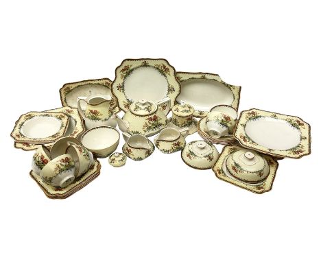 Early 20th century Crown Ducal part tea service decorated in  the Tulip pattern, to include six teacups and saucers, five sid