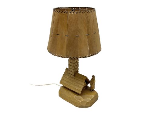 Mid 20th century Paul Caron carved table lamp, modelled as man standing before an oven, the chimney supporting the panelled s