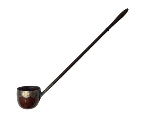 Georgian toddy ladle, with coquilla nut bowl with silver rim and mount to with a turned handle, L29cm