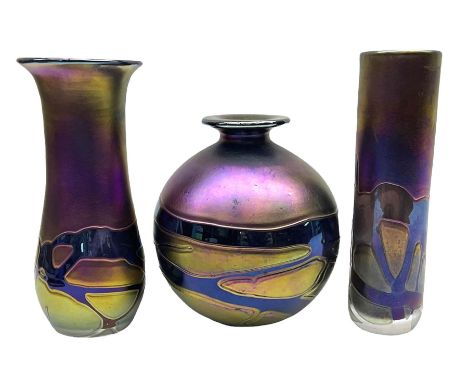 Group of Phoenician Malta art glass vases, all decorated with iridescent amethyst swirl pattern, comprising a spherical examp