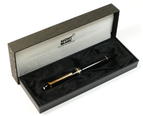 Mont Blanc Meisterstuck, a black body and gold plated rollerball pen, c. 1996, clip ring number EK1078066, guarantee booklet,