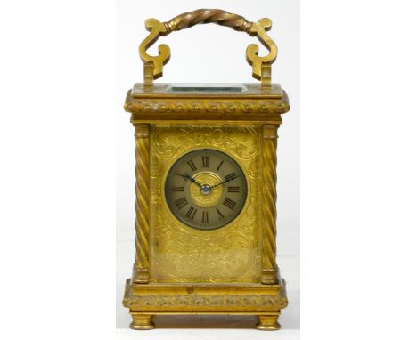 A French lacquered brass carriage clock, early 20th century, eight day movement stamped Made In France, with silvered platfor