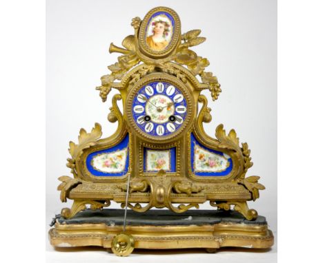 A Louis XVI style gilt metal and sevres porcelain inset mantel clock, late 19th early 20th century, the eight day movement st