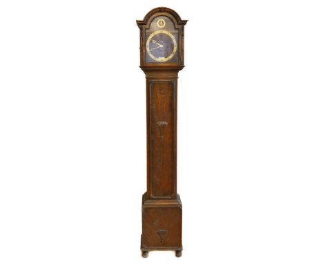 A mid 20th century oak cased grandmother clock, having silvered dial bearing Roman numerals, with enclosed eight day Westmins