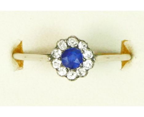 An Edwardian 18ct white gold, unmarked, sapphire and old cut diamond cluster ring, diameter 7mm, P, 1.6gm. 