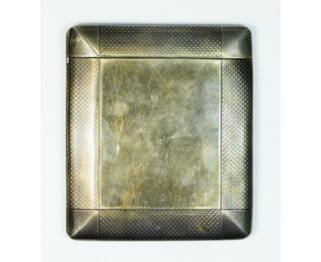 A silver cigarette case, London 1915, with top sliding mechanism, plain reverses with engine turned border, 8.5 x 9.5cm, 132g