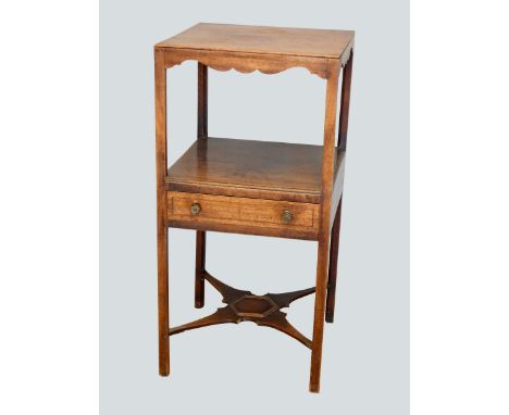 A George III mahogany washstand, having squared top over centralised shelf with single drawer below, raised on chamfered legs