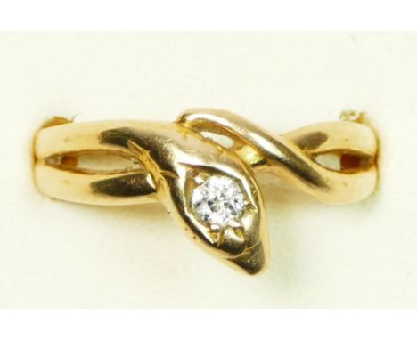 A Victorian 18ct gold and old cut brilliant diamond set snake ring, c.1890/1900, partial hallmarks, set with a 0.10cts stone,