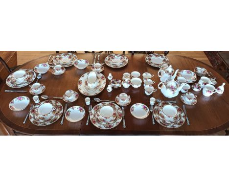 A Royal Albert Country Roses part dinner service, to include 7 dinner plates, 7 side plates, 6 dessert plates, 6 soup bowls w