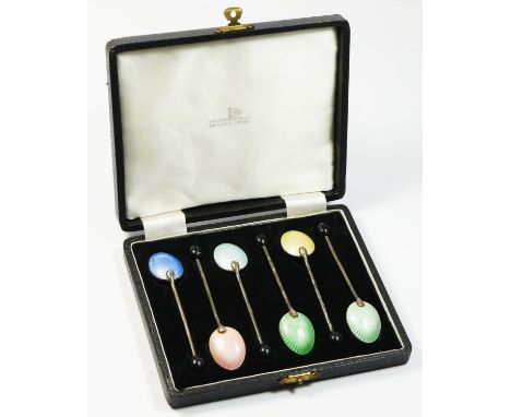 An Art Deco silver and enamel coffee bean spoon set of six spoons, unmarked, stamped ENGLAND, 53gm Walker &amp; Hall case. 