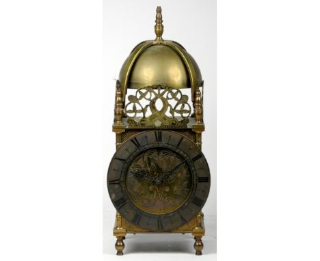 A late 19th century French XVII Style Brass Lantern Clock, with finial top, circular dial, silvered chapter ring with Roman n