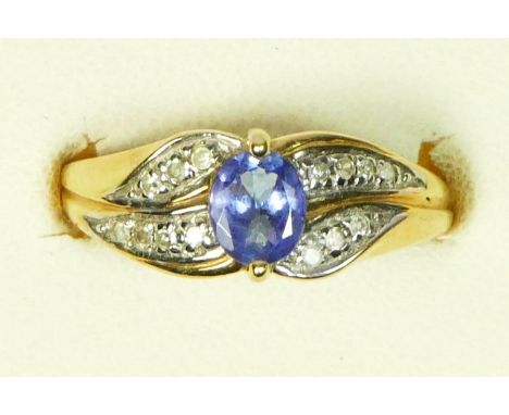 A 14K gold, tanzanite and diamond dress ring, L, 2.6gm 