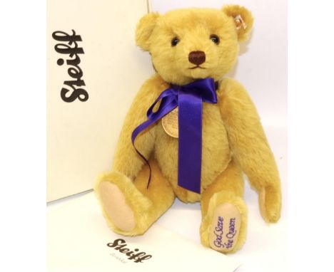 Steiff teddy bear: 'God Save The Queen' 663345, golden mohair musical teddy bear with medallion and purple ribbon, H31cm, wit