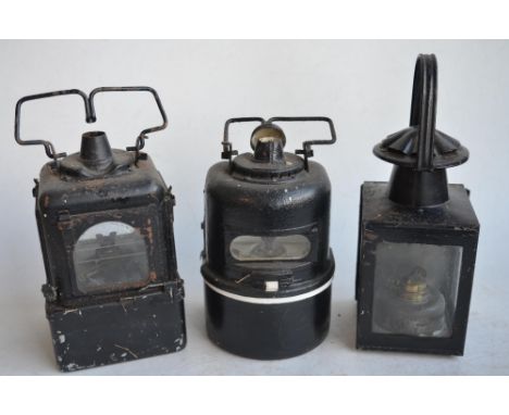 Three vintage railway lamps to include BR(M) half round lamp by Lamp Manufacturing &amp; Railway Supplies Ltd, a BR(M)M stand