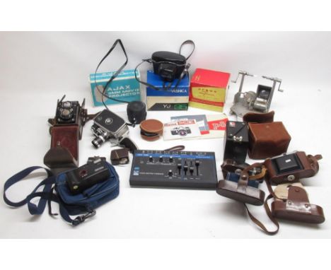 Collection of cameras and equipment inc. Yashica 35mm camera, Bolex Paillard camera, Microcord camera, Kodak Brownie, etc. (q