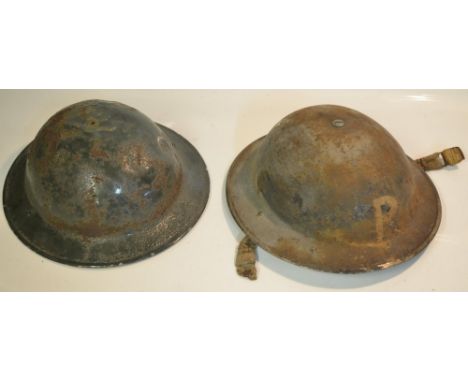 Vintage British steel Brodie helmets, one marked "R" (Rescue Party) front and back (2) 