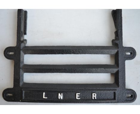 Original cast iron vintage LNER station fire grate front, overall size 56.7x40.4cm 