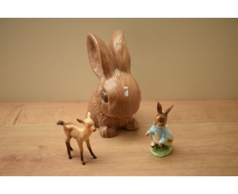 A Beswick Pottery Beatrix Potter character study 'Peter Rabbit' sold together with a Beswick Pottery Fawn model number 1000A 