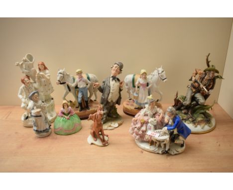 A large group of Capodimonte and similar porcelain figures and figurines including a Hunter, The Braggart and a couple playin