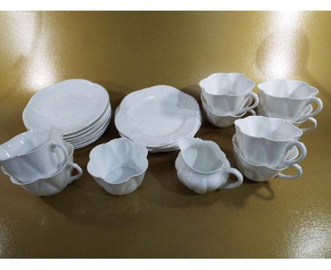 Shelley - approximately 25 pieces of white tableware comprising a sugar bowl, milk jug, 8 cups, 9 saucers and 6 plates