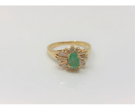 An 18ct gold emerald dress ring, size K CONDITION REPORT: 3.3g