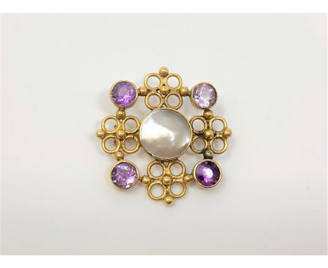 A gold, amethyst and mother of pearl brooch CONDITION REPORT: Apparently unmarked. 4.5g